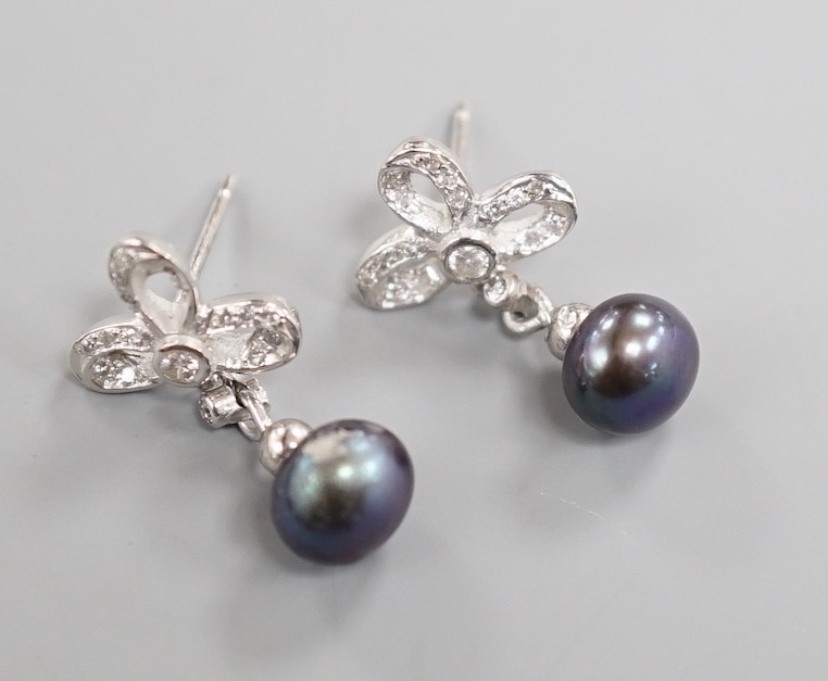 A modern pair of 750 white metal, Tahitian cultured pearl and diamond set drop earrings, 20mm, gross weight 3.8 grams.